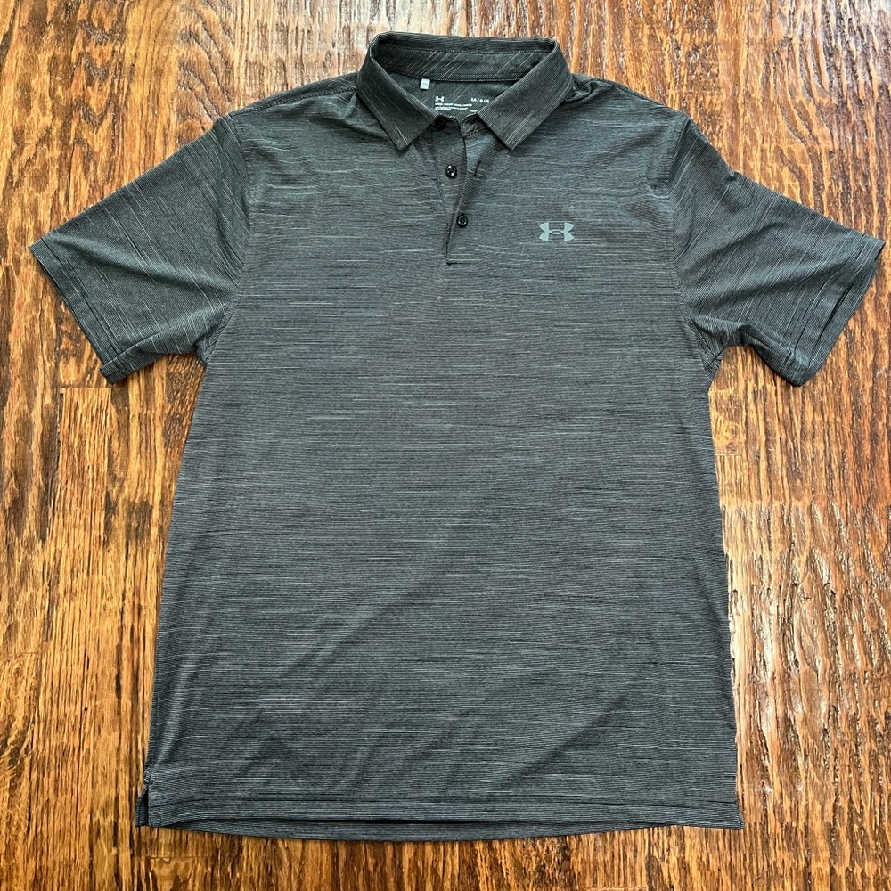 Under Armour men’s loose fit gray polo shirt. Brand new, never worn